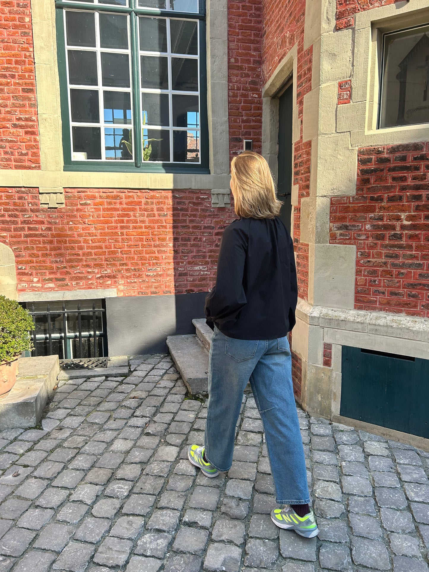 Loose blouse with bow neck