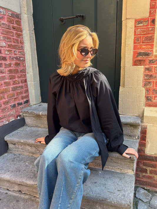Loose blouse with bow neck